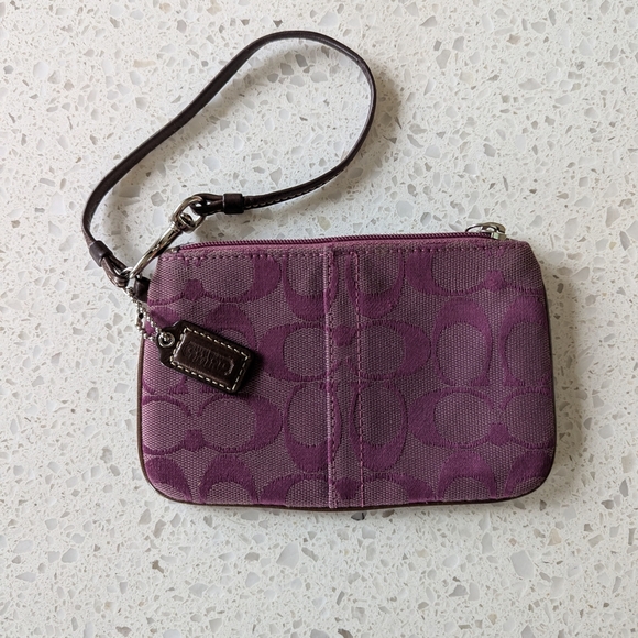 Coach Handbags - Coach signature optic wristlet Wallet in purple canvas with leather trim